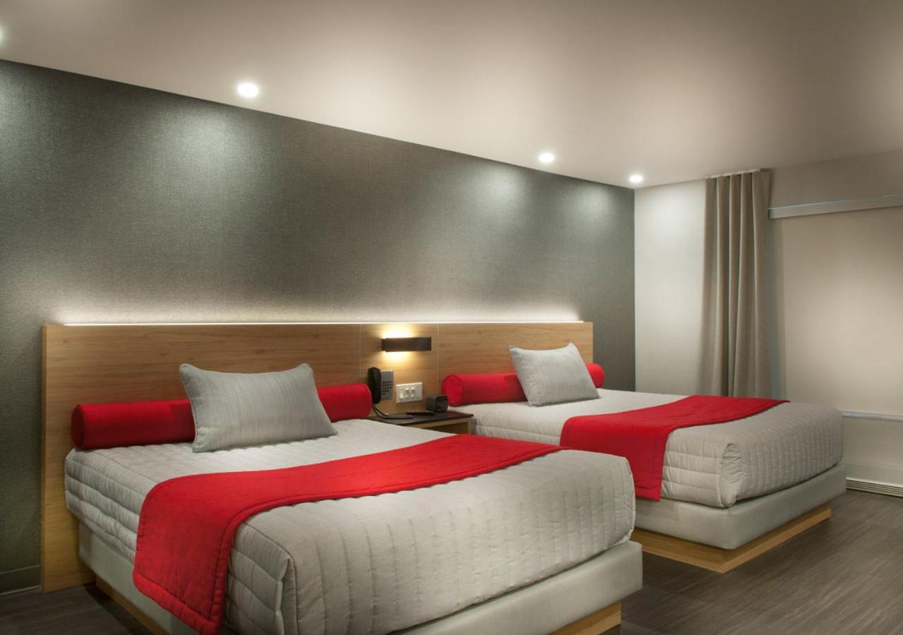 מלון Ramada By Wyndham לאוול מראה חיצוני תמונה