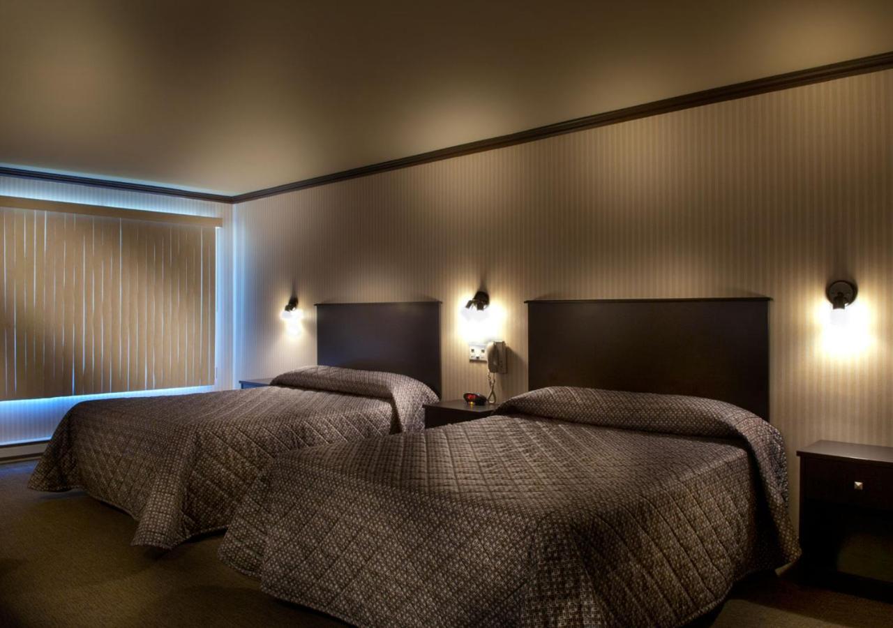 מלון Ramada By Wyndham לאוול מראה חיצוני תמונה