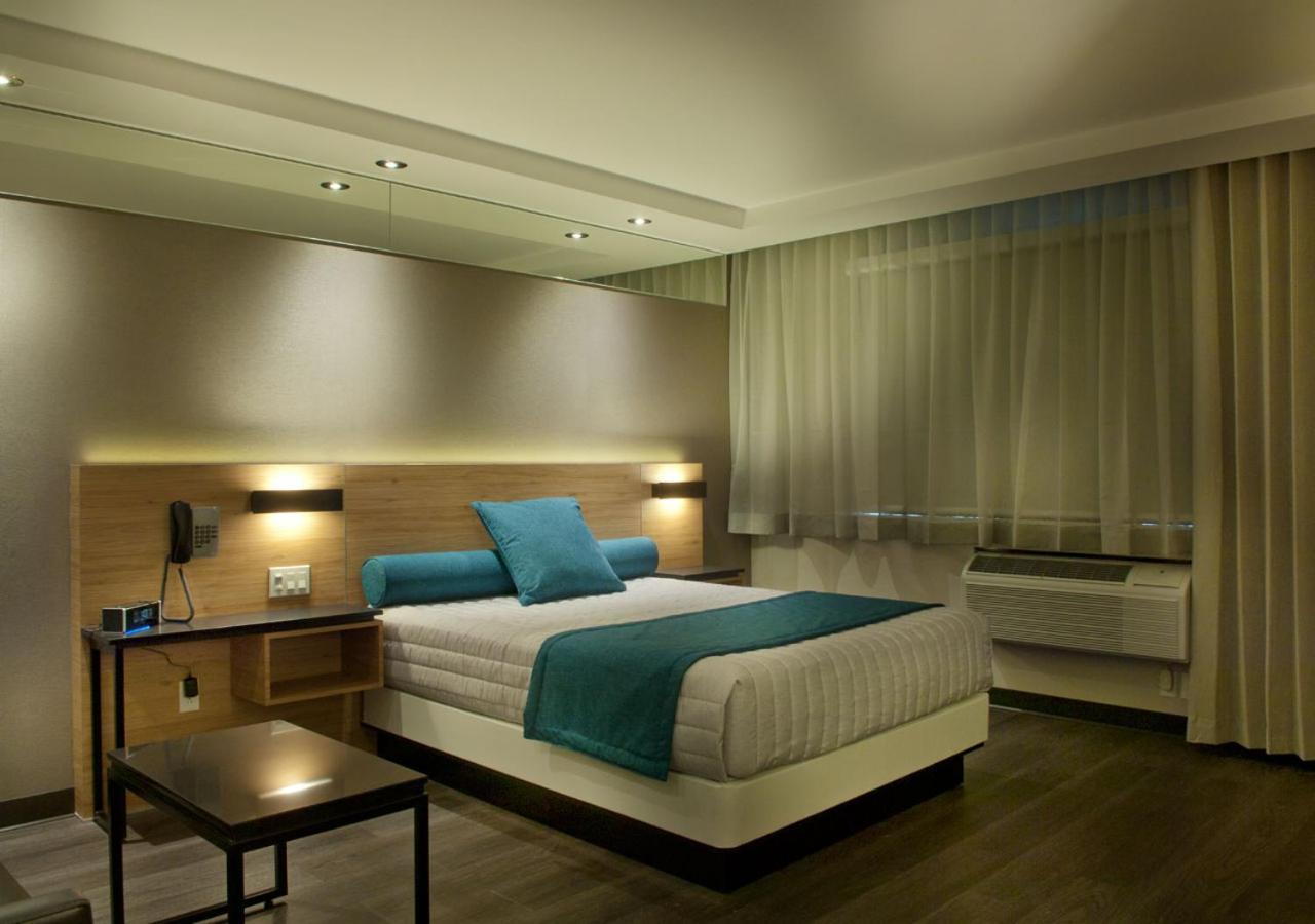מלון Ramada By Wyndham לאוול מראה חיצוני תמונה